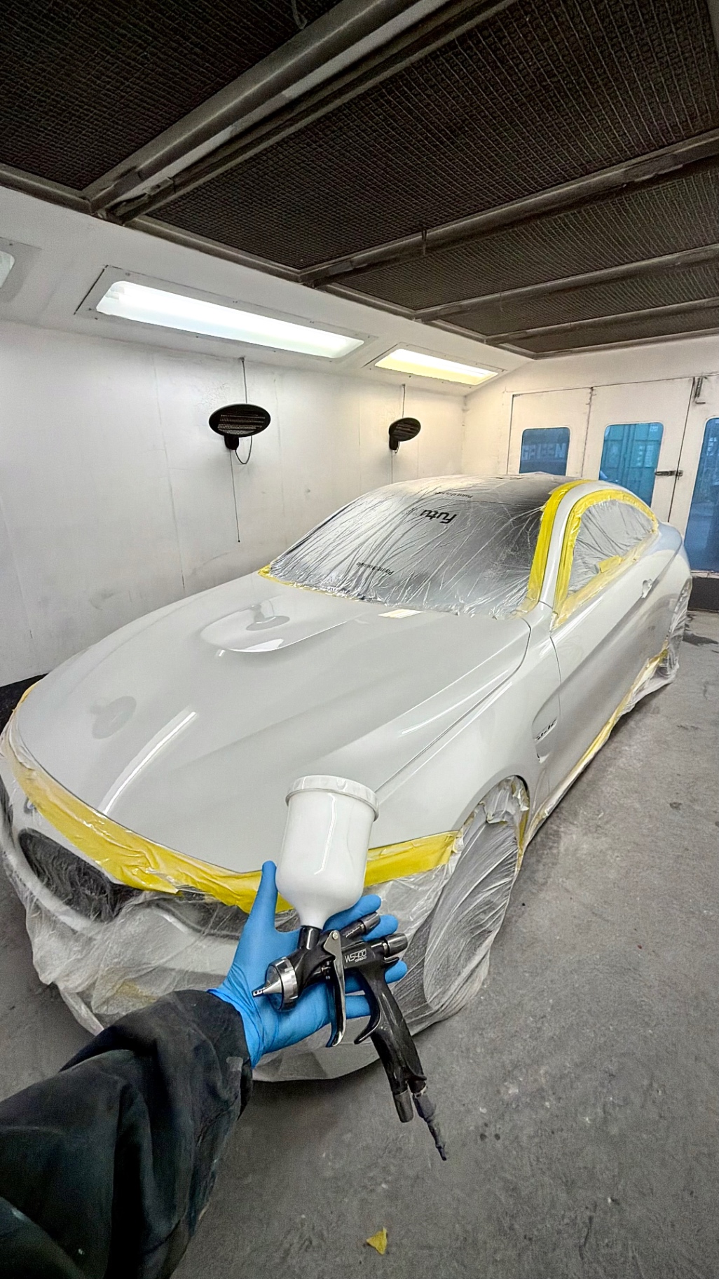 BMW being professionally refinished in the JDP Autobody spray booth near Stroud